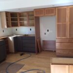 Complete kitchen cabinet install in progress